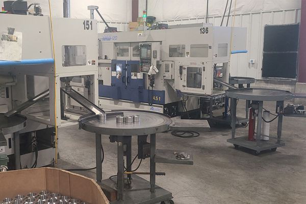 Automated powder metal production cells